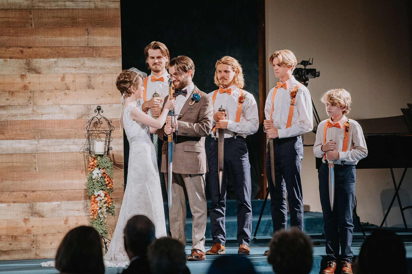 When the older Long sons turned 13, they were each presented with a sword by their parents. During the ceremony, Sarah and Gage wound her purity ring around his sword with a piece of leather.