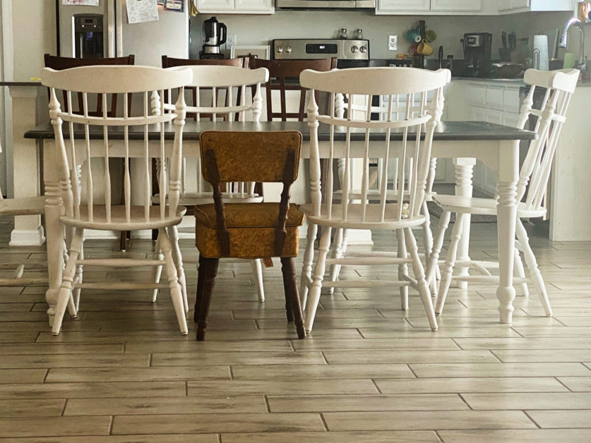 I loved the juxtapositioning of Meagan's grandma's old sewing chair at the dinner table.
